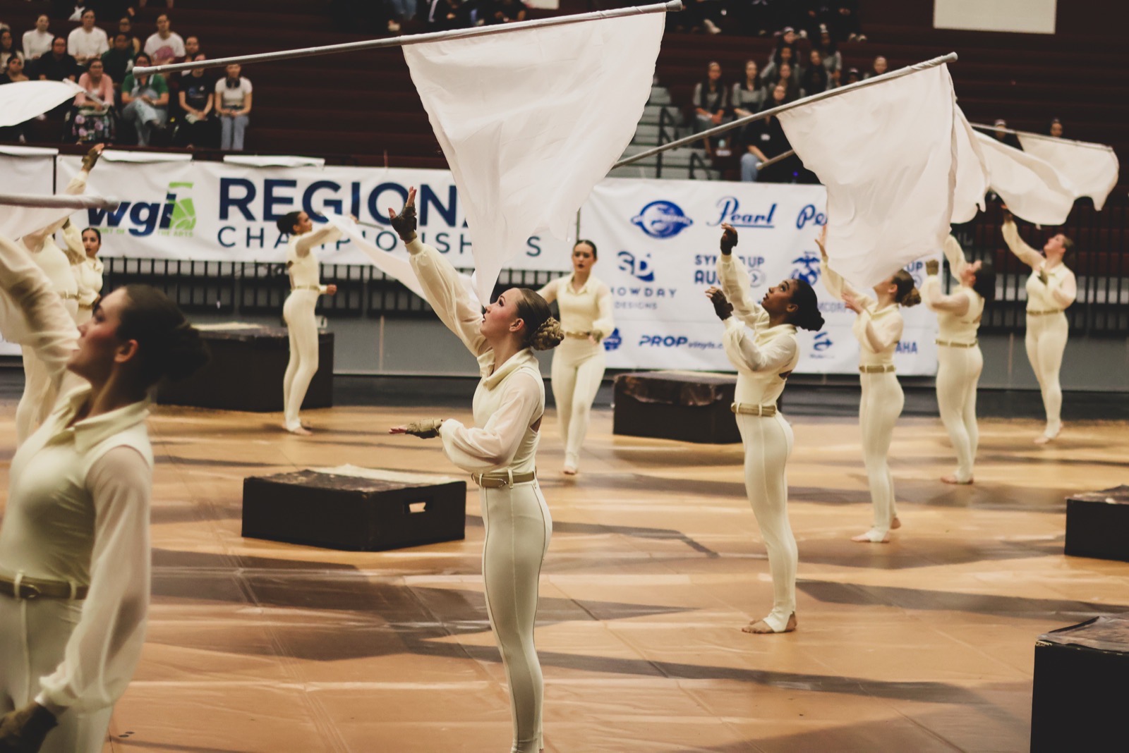 Little Elm color guard performing with flags